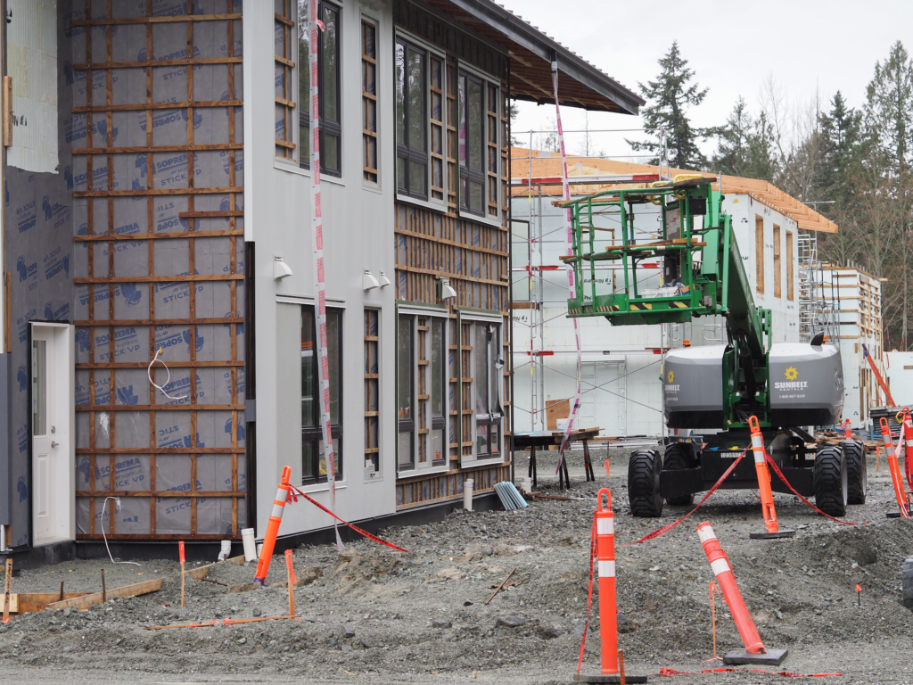 Tsawout First Nations multiplex housing project by Yell-Quay-Tza Solutions, showing the buildings under construction in December 2025.